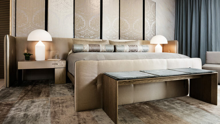 Luxurious Como Bed bedroom with king-sized bed, upholstered headboard, and matching nightstands
