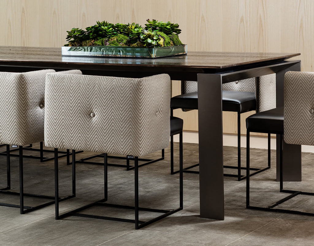 Cairo Table modern dining setup with upholstered and leather chairs