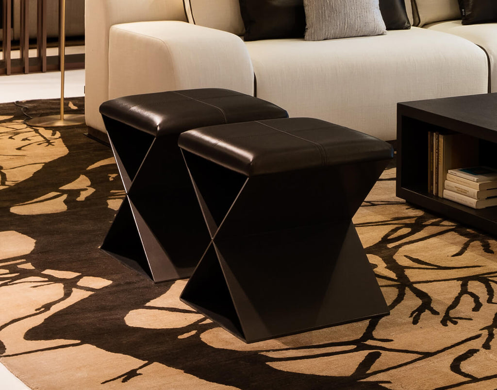 Dark brown leather ottomans with X-shaped metal resin coated bases for Mons Table