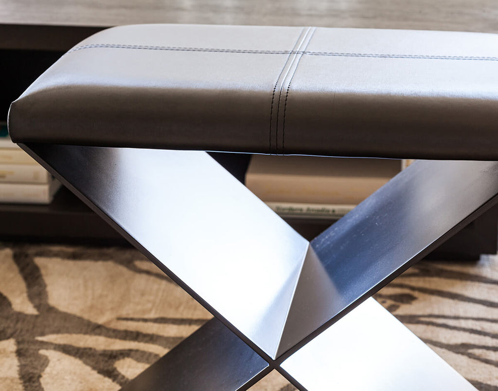 Modern brown faux leather Mons Table ottoman with metal resin coated X base