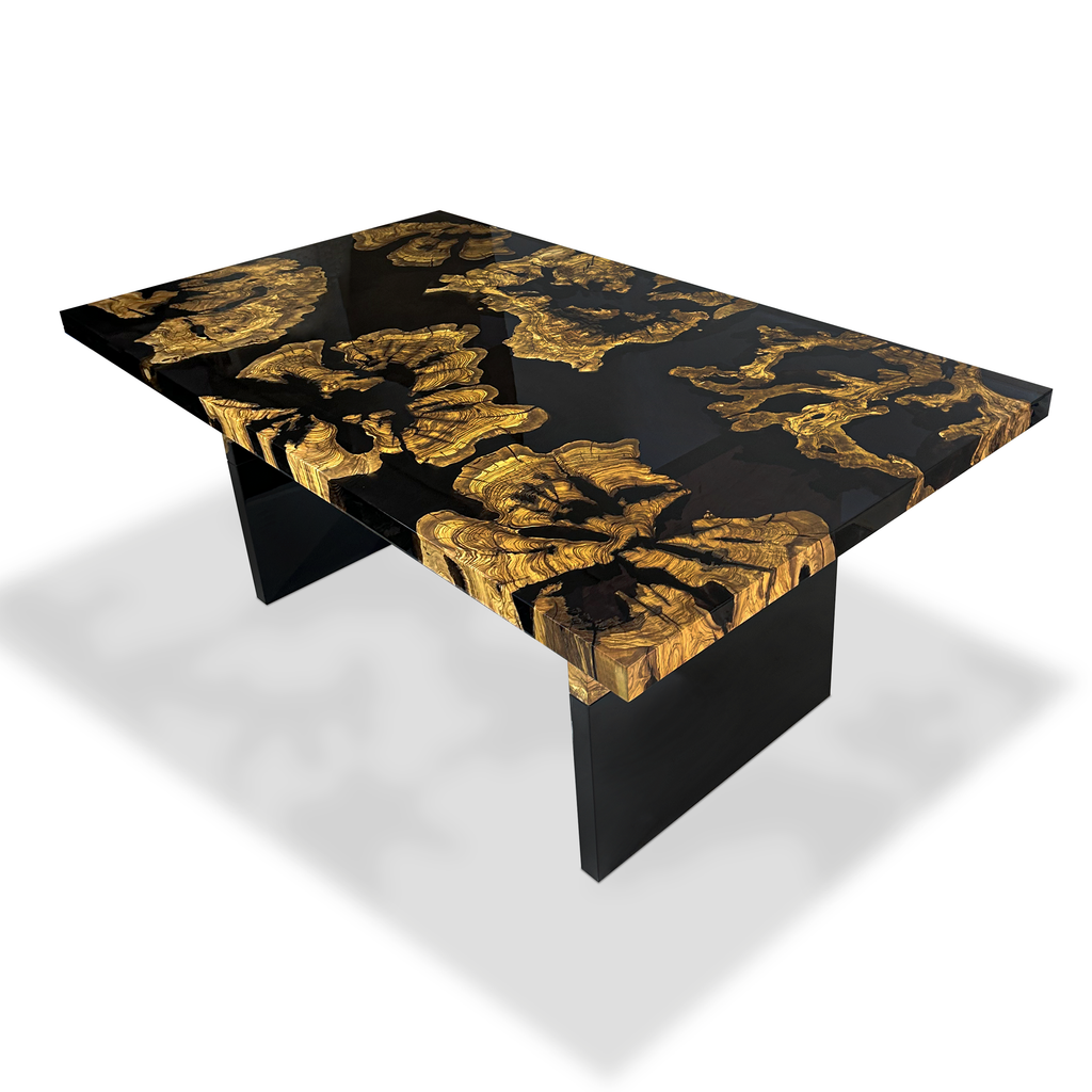 Black Thyria Olive Wood Dining Table with black resin top and golden-brown olive wood accents