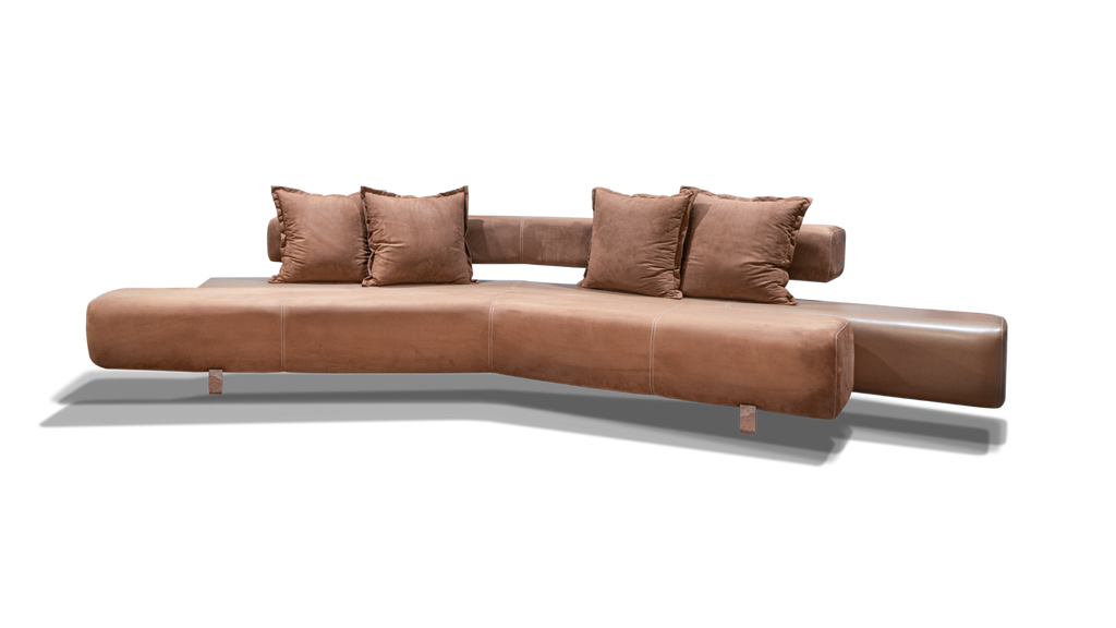 Tan-colored nice angled sofa with six throw pillows, perfect for modern living rooms