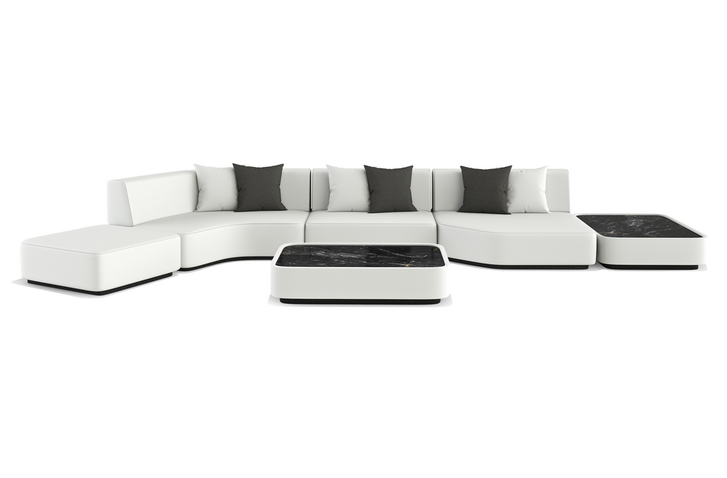 Modern white Orpheus Sectional Outdoor Set with dark pillows and black marble tables