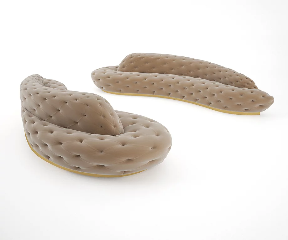 Allure Sofa with two textured brown cushions resembling human feces for unique decor