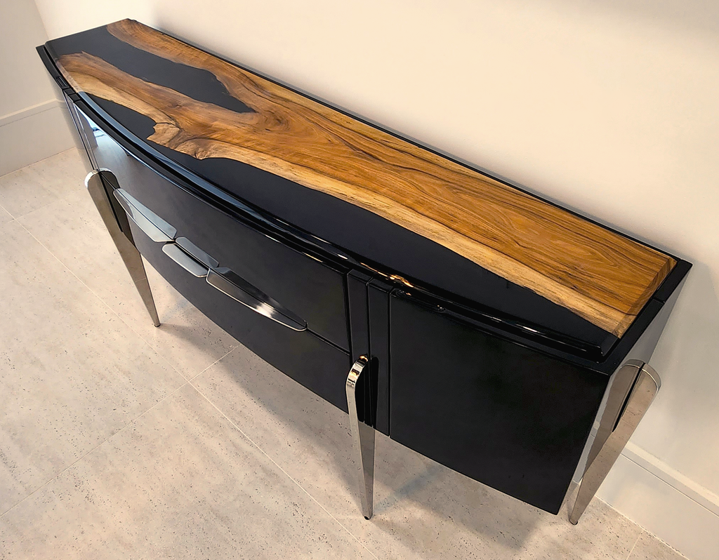 Black Padua Console with glossy body, black live-edge wooden top, and metal legs