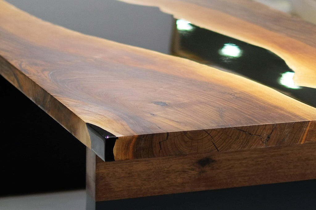 Black Thyria River Walnut Dining Table with live-edge wood, resin river, and integrated lighting