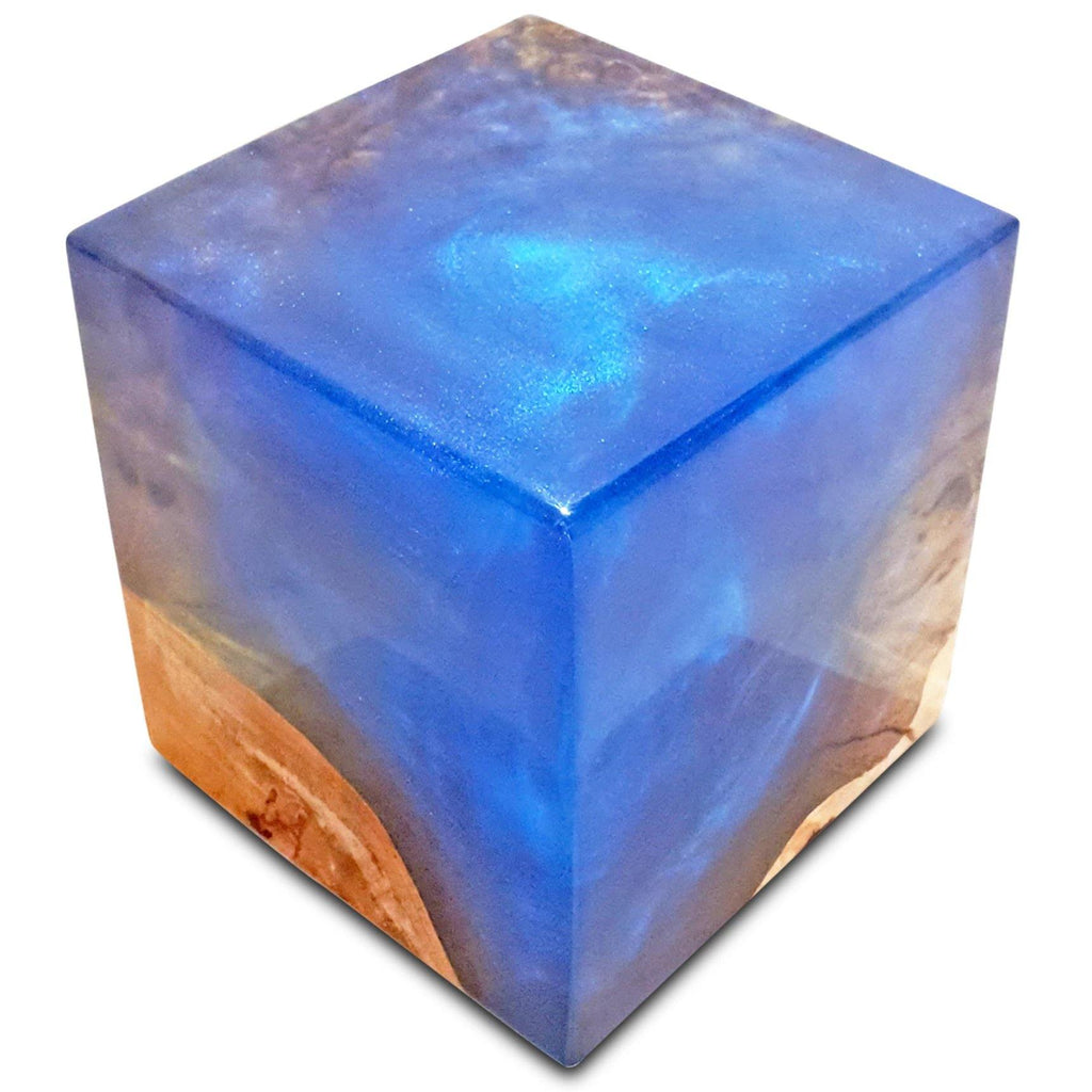 Blue decorative cube with clear blue resin and natural wood base for stylish decor