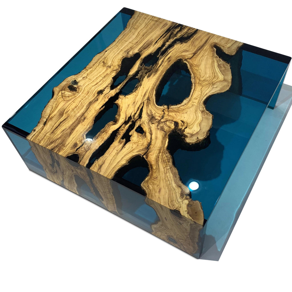 Blue Waterfall Olive Coffee Table made from gnarled wood slab encased in blue resin