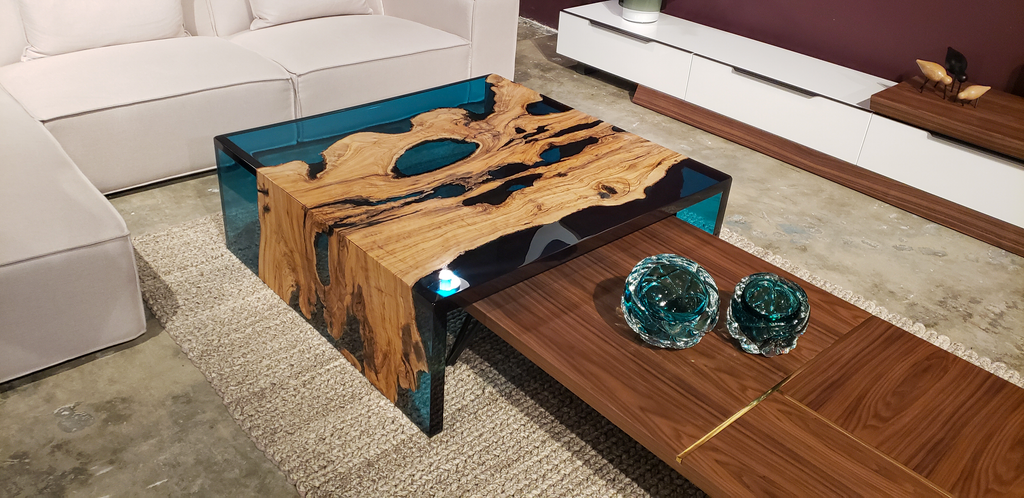 Blue Waterfall Olive Coffee Table with light wood slab, dark voids, and blue resin accents