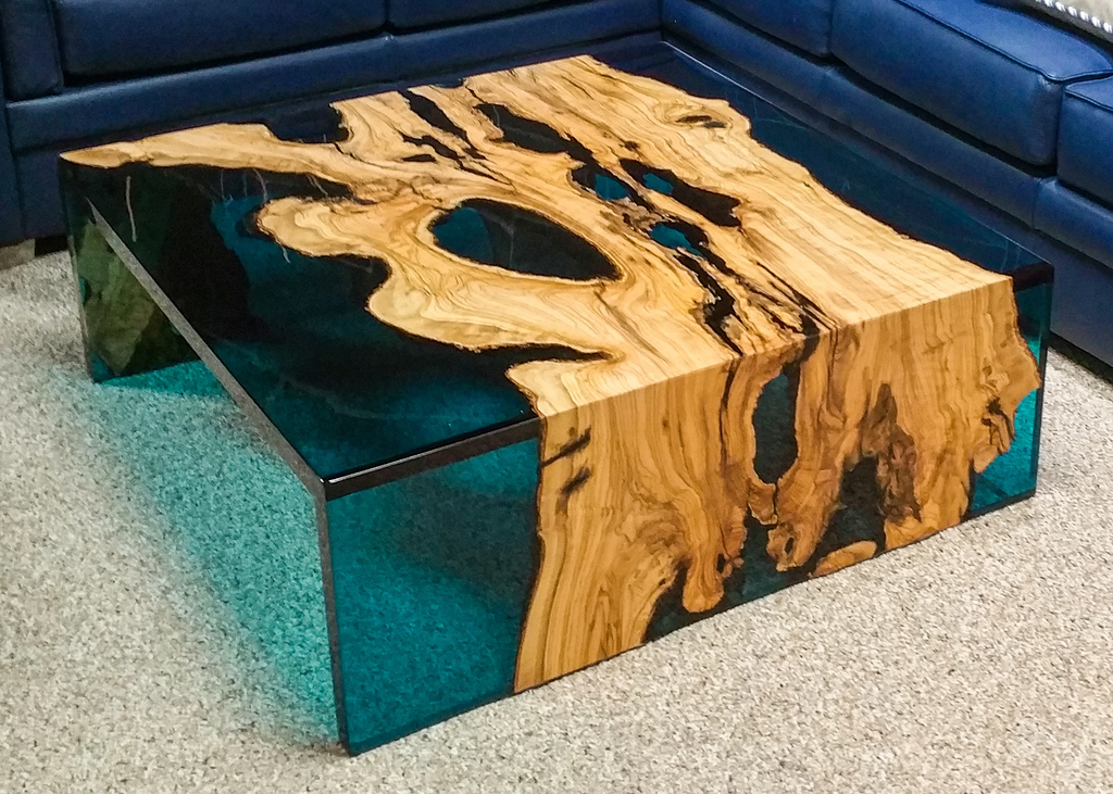 Blue Waterfall Olive Coffee Table with natural wood and shimmering dark teal epoxy resin
