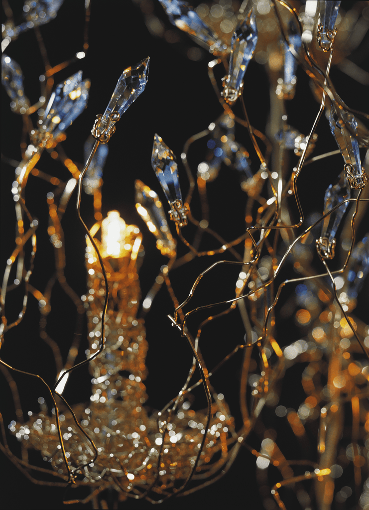 Spirits Chandelier Round with clear crystal accents and gold wires illuminated warm light
