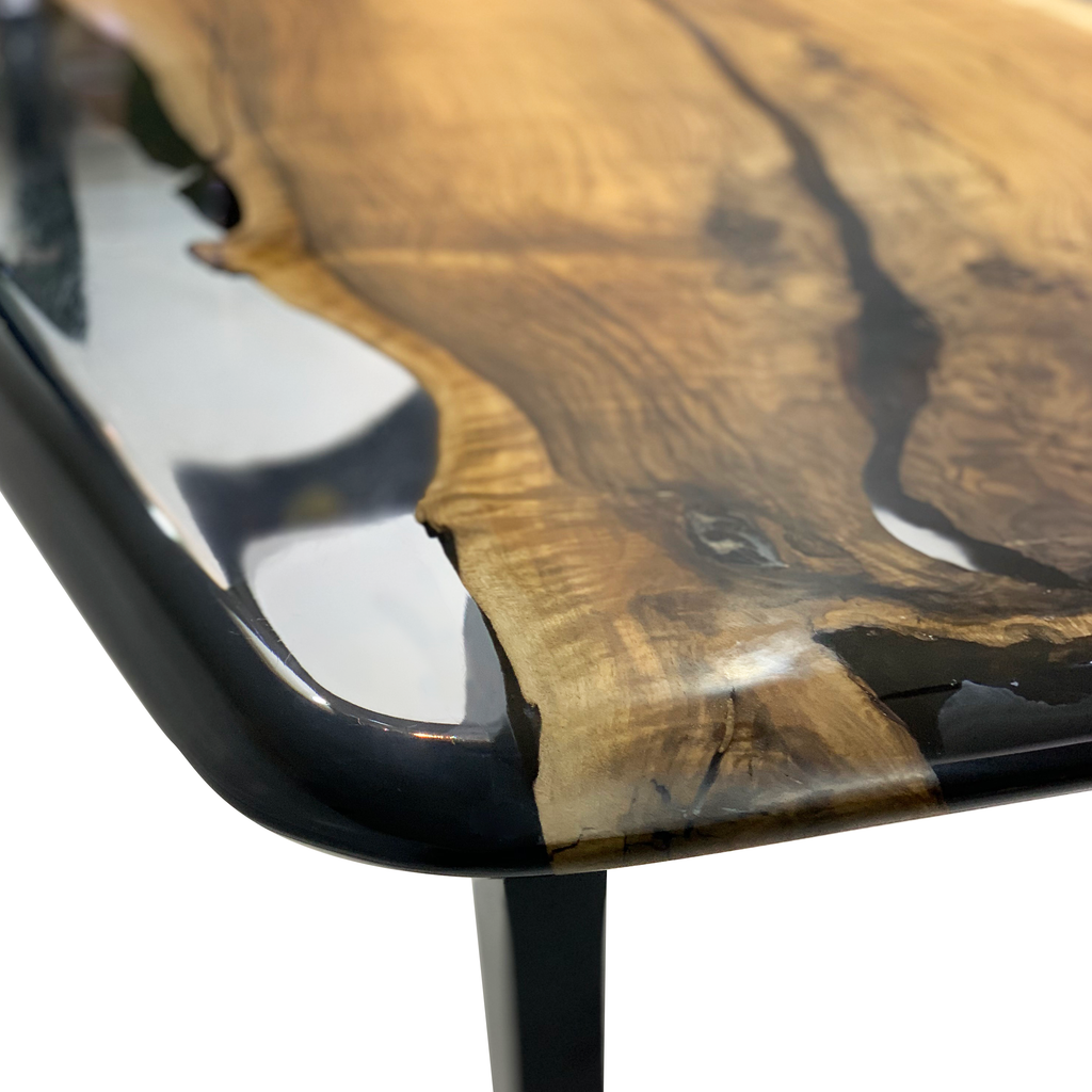 Carna Walnut Dining Table with dark-edged epoxy river and light brown live-edge walnut slab