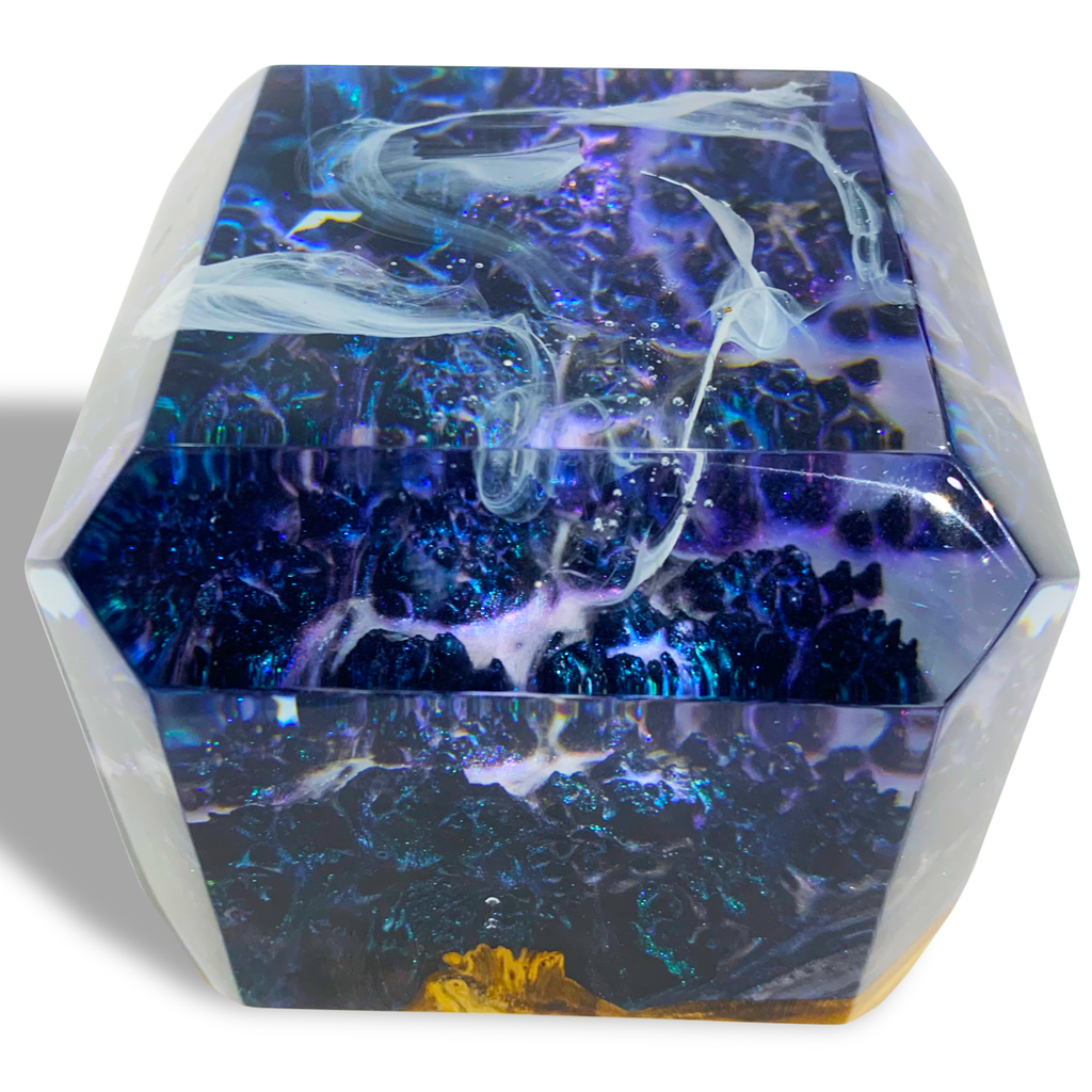Dream Space Blue Cube resin art with swirling white, purple, and blue patterns on gold base