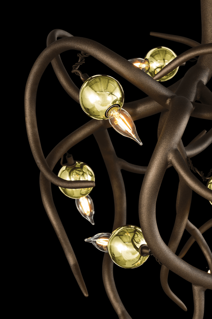 Eve Chandelier Conical with bronze sculpture, spherical glass elements, and leaf-shaped bulbs