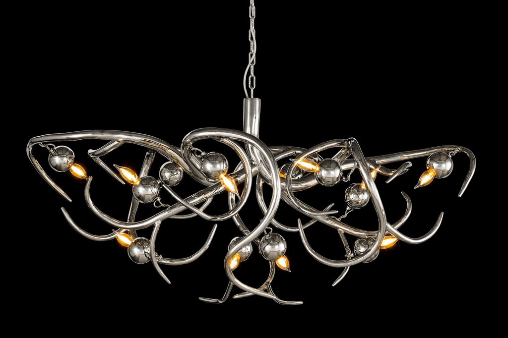 Modern silver Eve Chandelier Oval with curved arms, spherical accents, and upward-facing lights