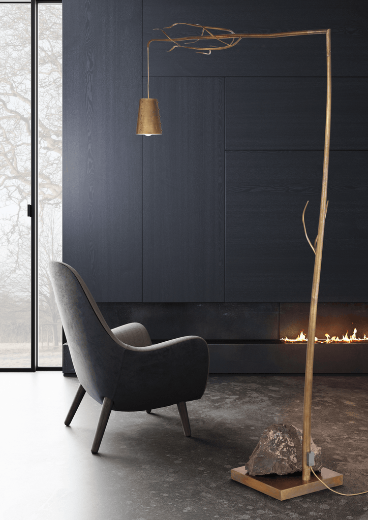 Flintstone Floor Lamp with branch-like bronze frame, conical shade, and natural rock base
