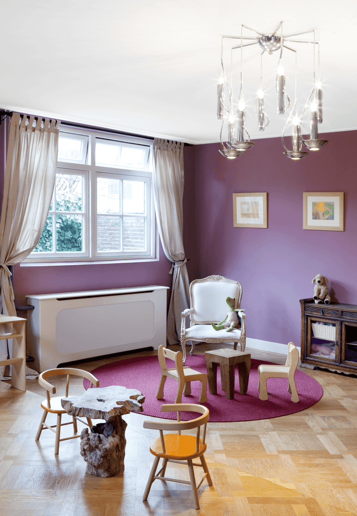 Child’s room with purple walls and light wooden flooring featuring Floating Candles Hanging Lamp with custom height
