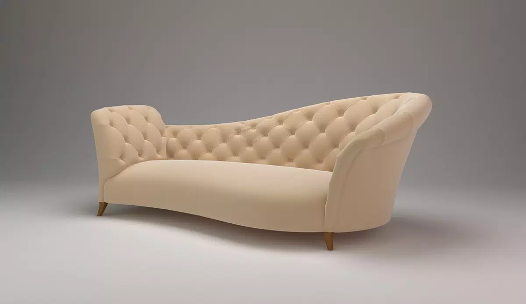 Harry Hines Lounge curved beige velvet sofa with wooden legs for stylish comfort