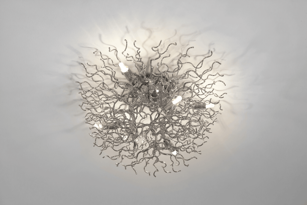 Hollywood ceiling lamp round with ornate silver-toned fixture and branch-like arms