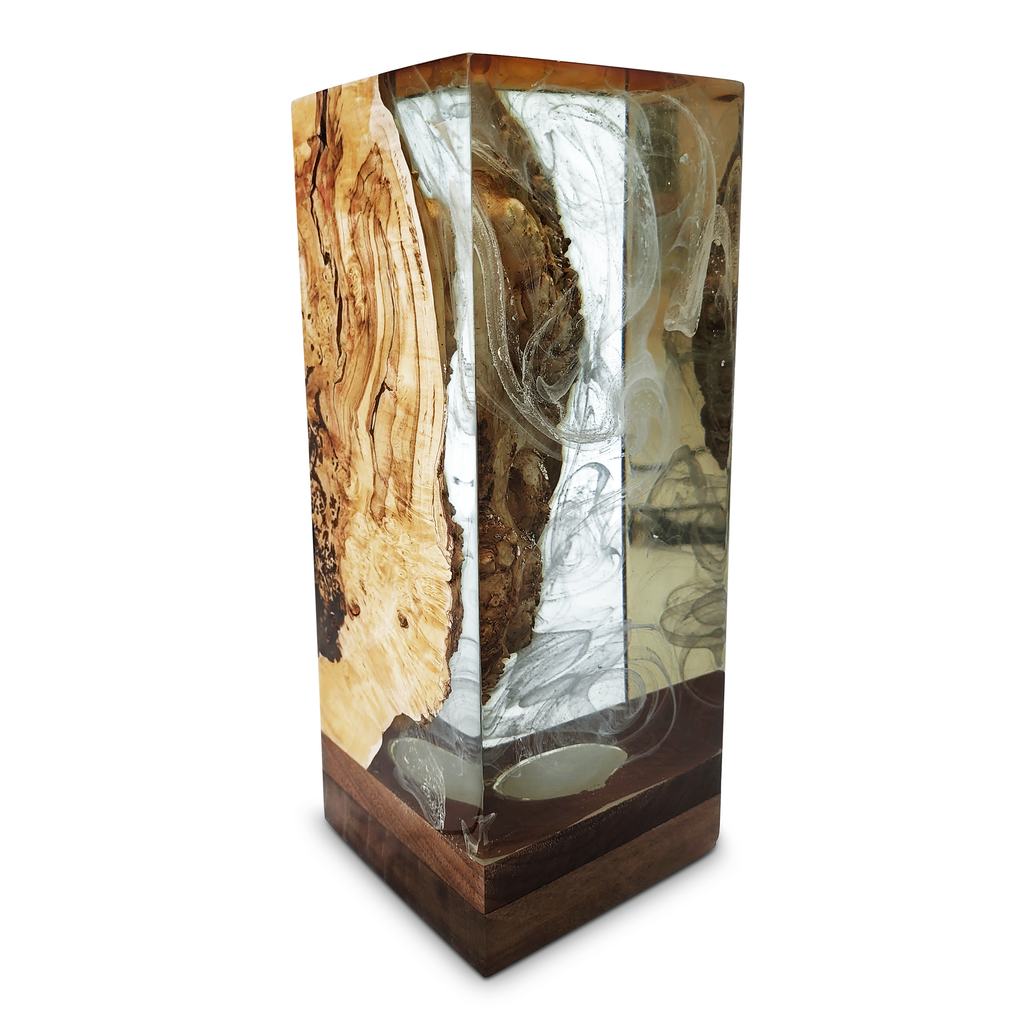 Ocean cube table lamp featuring a rectangular wood and resin cube with swirling white and brown inclusions