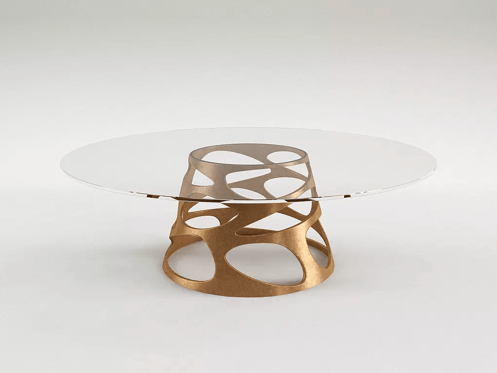Open dining table with round glass top and bronze-colored openwork base
