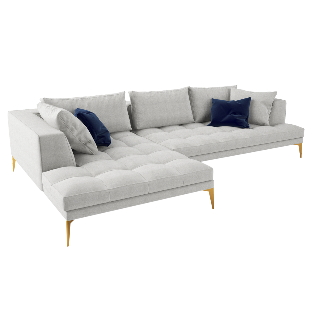 Light grey L-shaped Parma Sofa with dark blue throw pillows and wooden legs