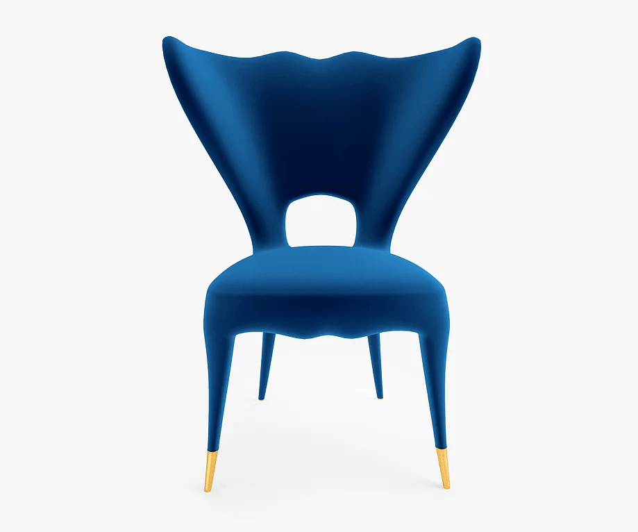 Victory Chair in royal blue velvet with wavy backrest and gold-tipped tapered legs